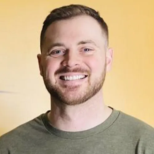 Dr. Aaron Zimmerman, chiropractor, smiling headshot