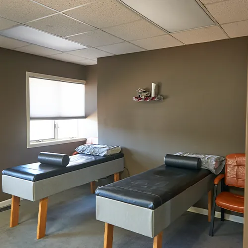 Two roller treatment tables in a Bear Chiropractic therapy room